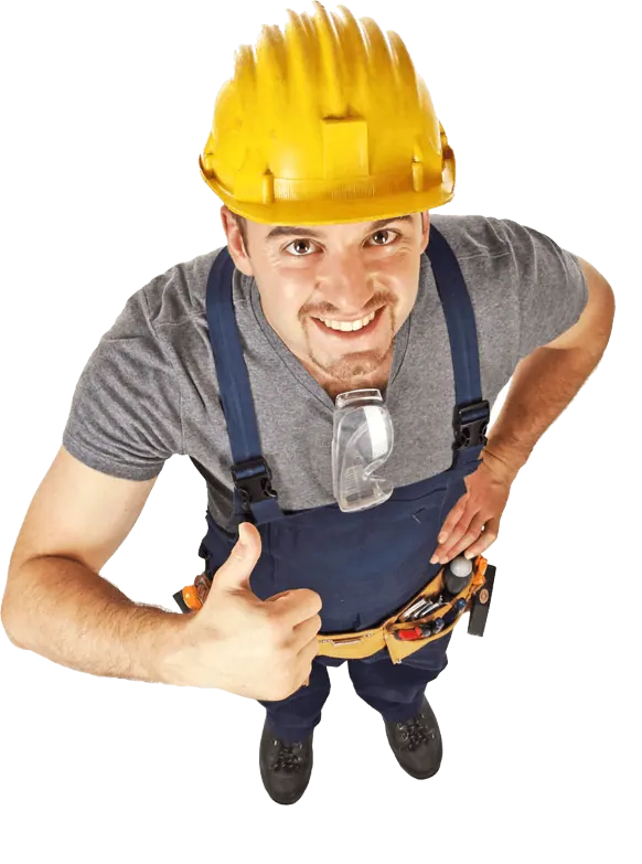 Smiling contractor in a yellow hard hat and overalls giving a thumbs-up